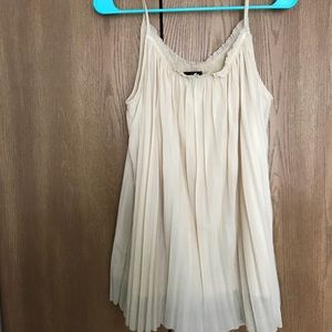 Flowy cream spaghetti strap tank top